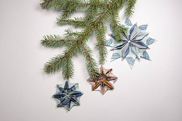 christmas tree decorations and fresh cut flowers in snow, taken on South coast England UK