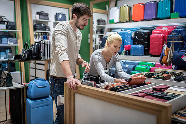 istock Couple inside luggage store 629797888