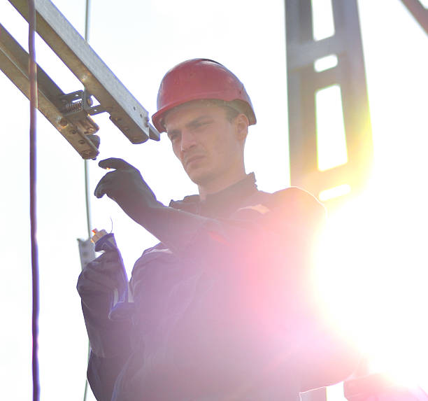 istock Electrician Working in Hight with Protective Equipment 629798508