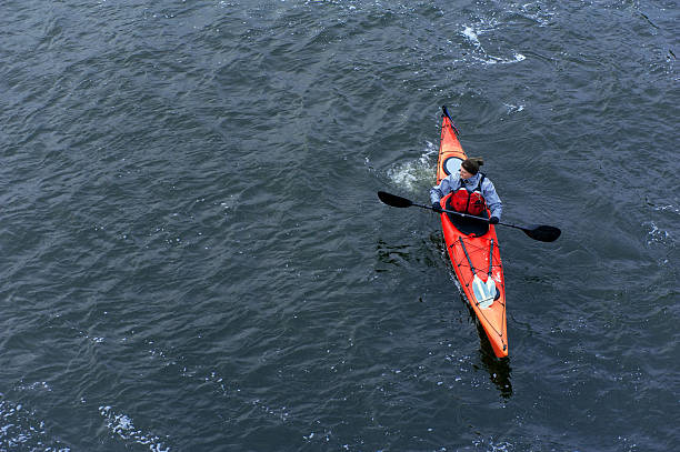 istock winter kayaking on the river in Ukraine 17 629800706