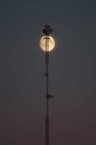 moon and communications tower - full moon audio imagens e fotografias de stock