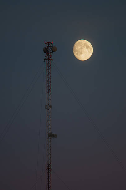 moon and communications tower - full moon audio imagens e fotografias de stock