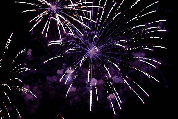 Purple Explosions in the Sky, Dubai New Year stock photo