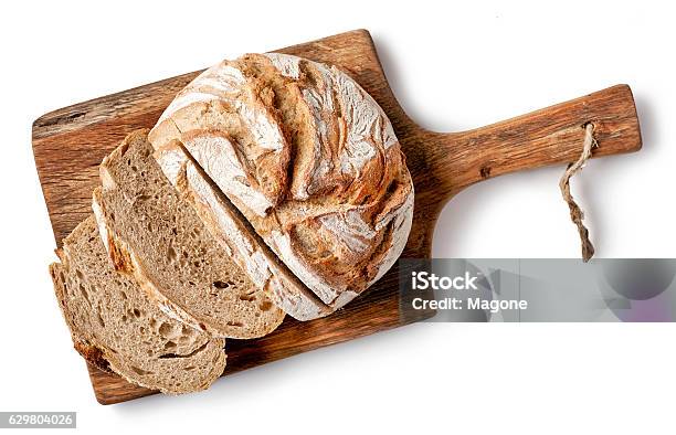 Freshly Baked Bread Stock Photo - Download Image Now - Bread, White Background, Cutting Board