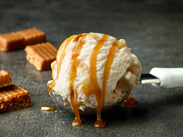 istock ice cream with caramel sauce 629805334