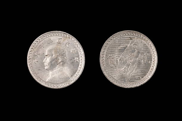 istock Taiwanese Coin Isolated On A Black Background 629806766