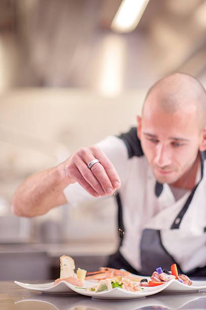 istock Seafood Starter Preparation in the Restaurant Kitchen 629808316