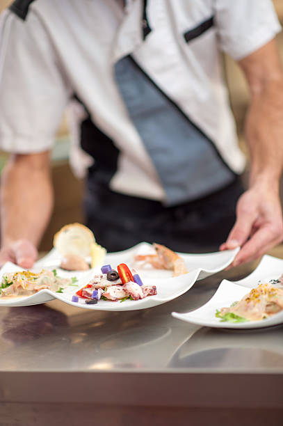 istock Seafood Starter Preparation in the Restaurant Kitchen 629808328