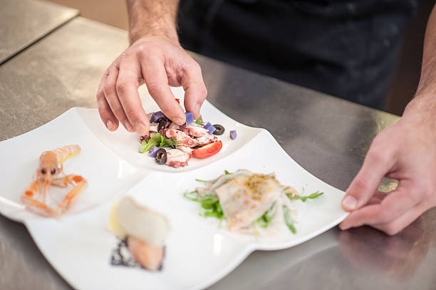 istock Seafood Starter Preparation in the Restaurant Kitchen 629808336