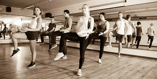 Photo of Men and ladies dancing