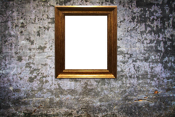 istock wooden picture frame on old wall background 629810786