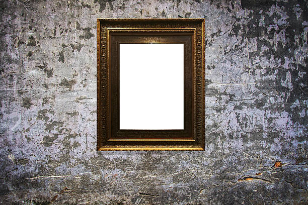 istock wooden picture frame on old wall background 629810898