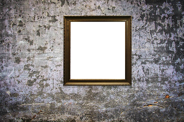 istock wooden picture frame on old wall background 629811464
