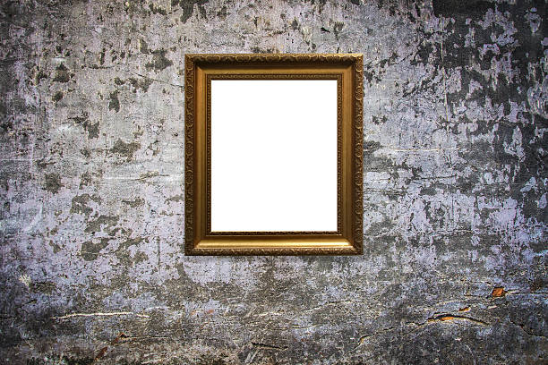 istock wooden picture frame on old wall background 629811832