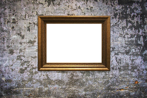 istock wooden picture frame on old wall background 629811922