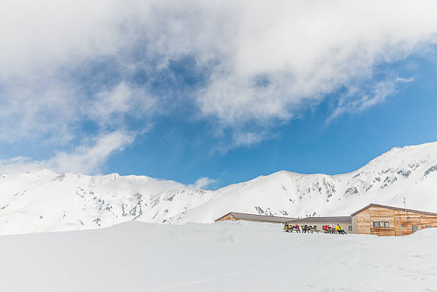 High mountains under snow with clear blue sky Panoramic view of Mountains in Murodo, Tateyama Kurobe Alpine Route ,Japan japanese snowboarder stock pictures, royalty-free photos & images