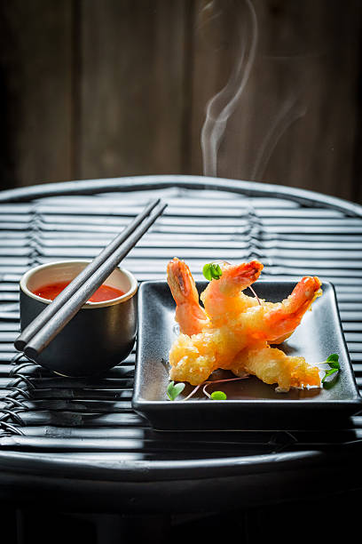 istock Delicious shrimp in tempura with red sauce 629816440