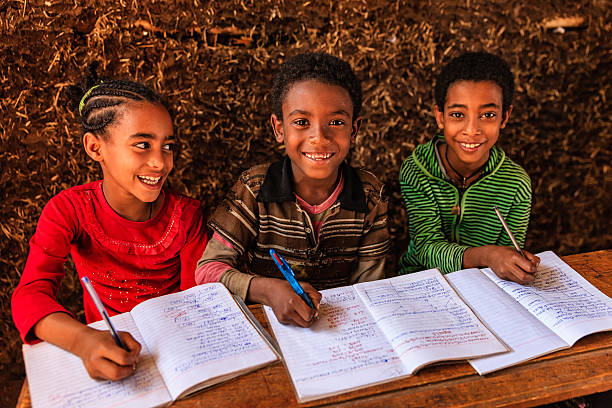 istock African children during the class, East Africa 629816664