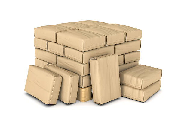 istock Rendering of light brown paper sacks piled on wooden pallet 629817432