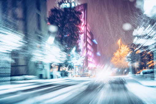 Snowfall at night in the city.Blurred Motion