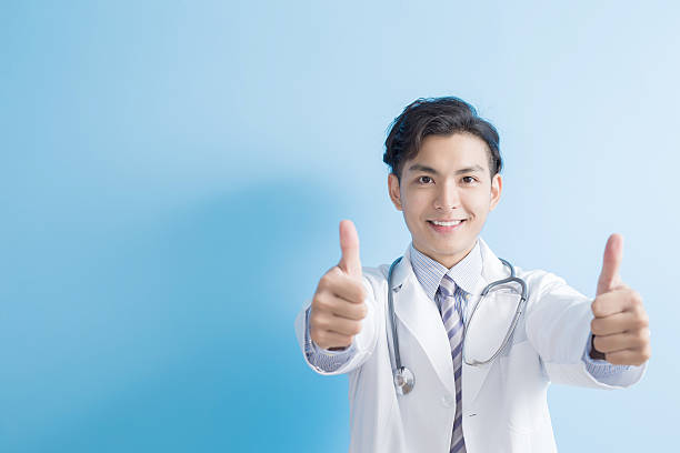 istock Male doctor show thumb up 629822472