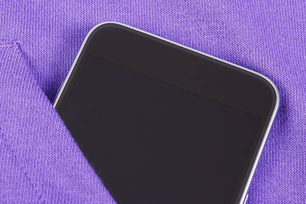 istock Mobile phone with blank screen in pocket sweatshirt, smartphone 629822476