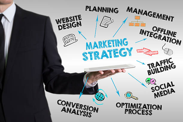 istock Marketing Strategy concept, young man holding a tablet computer 629824198