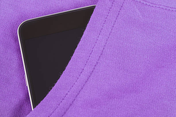 istock Mobile phone with blank screen in pocket sweatshirt, smartphone 629825868