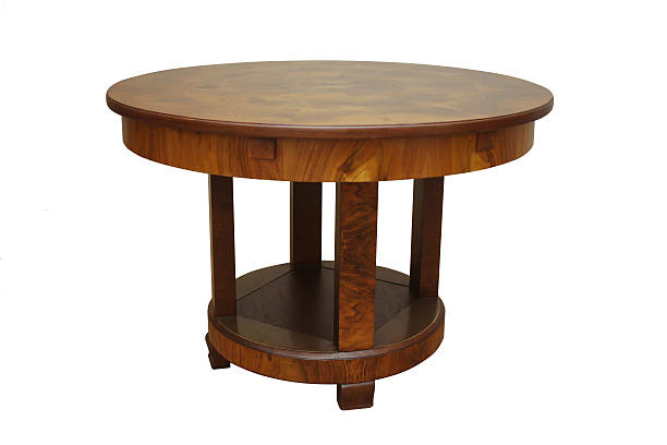 istock Antique walnut art deco dining table on white background 629828878
