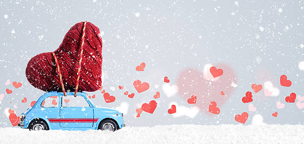istock Retro toy car with Valentine heart 629830654