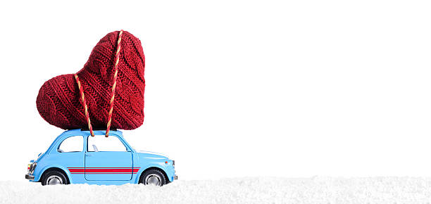 istock Retro toy car with Valentine heart 629830684