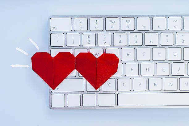 istock heart on the keyboard, dating online concept 629830722