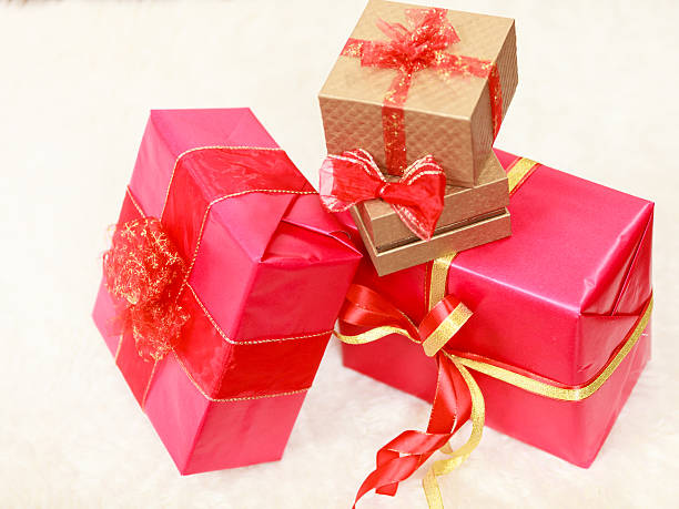 istock Many red and golden gift boxes 629831902