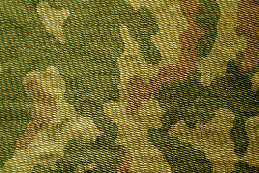 Textile camouflage cloth pattern. Abstract background and texture for design and ideas.