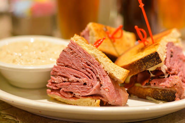 Corned beef pastrami sandwich close up Corned beef pastrami sandwich close up pastrami stock pictures, royalty-free photos & images
