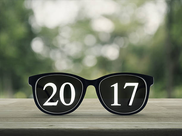 istock New year 2017 text with eye glasses 629833834