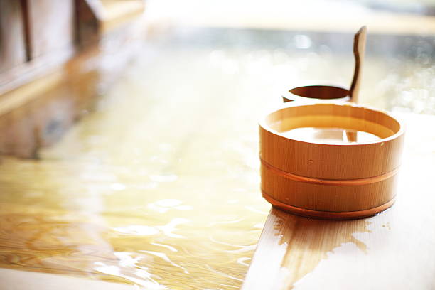 istock Wooden bucket by a hot spring 629834014