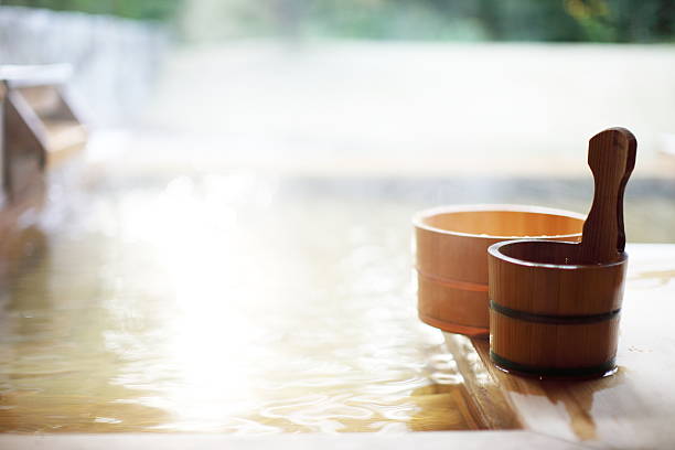istock Wooden bucket by a hot spring 629834060