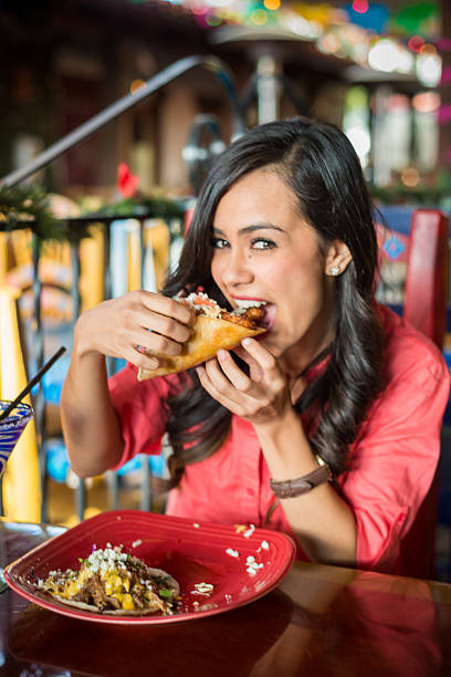 Young Hispanic Women At Mexican Restaurant stock photo