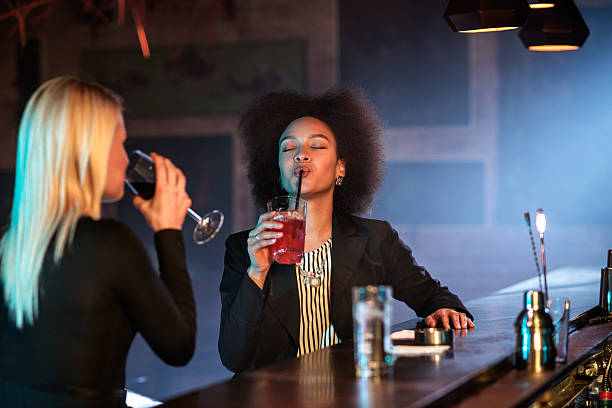 istock Female friends in the bar 629837242