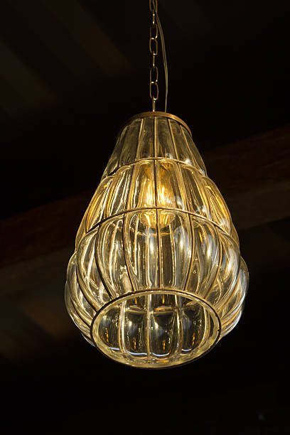 istock Single beautiful lamp hanged to the ceiling by chain 629862450