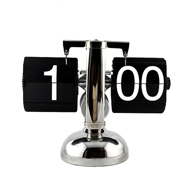 istock Isolated vintage flip clock at one o'clock 629863394