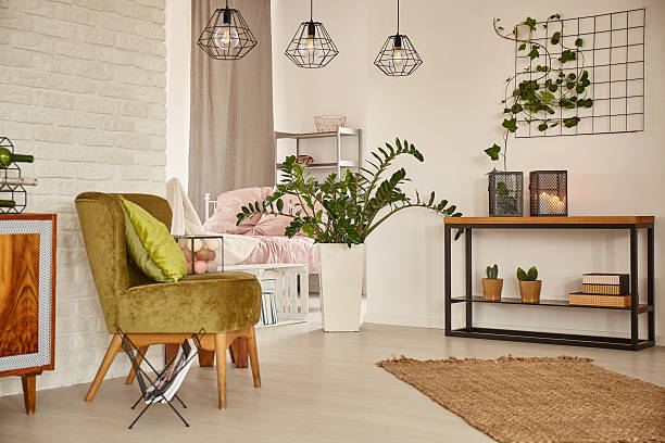 istock White interior with green armchair 629863414