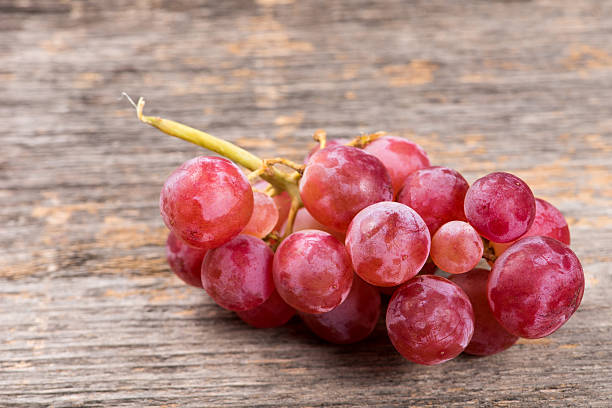istock Pink bunch of grapes 629863594