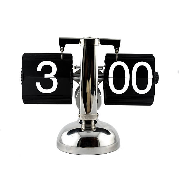 istock Isolated vintage flip clock on at three o'clock 629864154