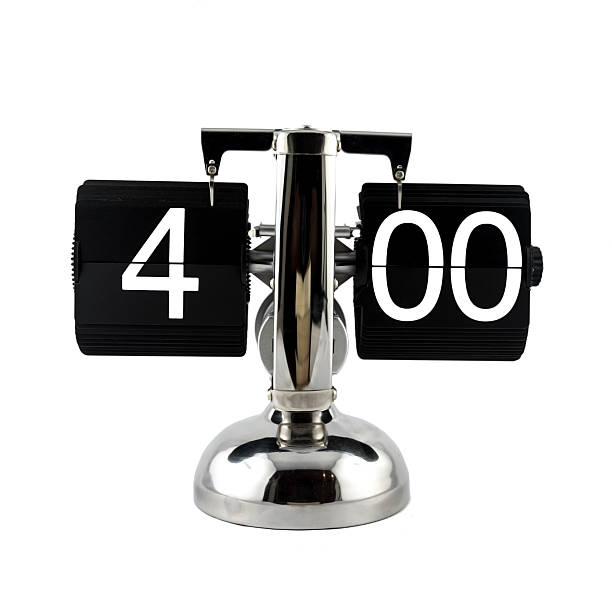 istock Isolated vintage flip clock at four o'clock 629864820