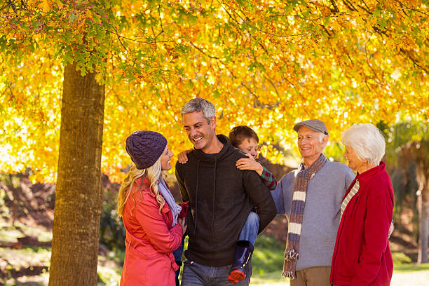 istock Multi-generation family enjoying at park 629865120