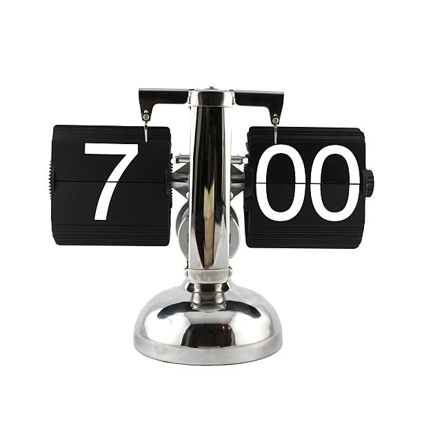 istock Isolated vintage flip clock at seven o'clock 629865360