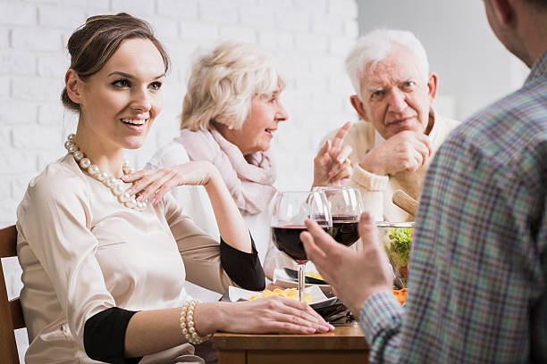 istock Family discussing at dinner time 629867052