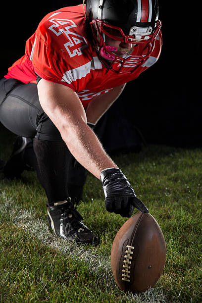 istock American football player in action 629869322